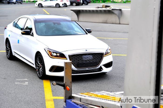 Illustration for article titled Genesis G80 Sport, The Blue Seated Carbon Fiber Trimmed Gold Stiched Steering Wheel Twin-Turbo Sedan All Three Of Us Have Been Waiting For...